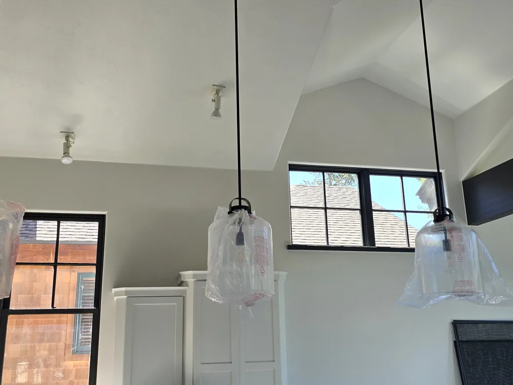 Finished white vaulted ceiling and walls in a Breckenridge kitchen