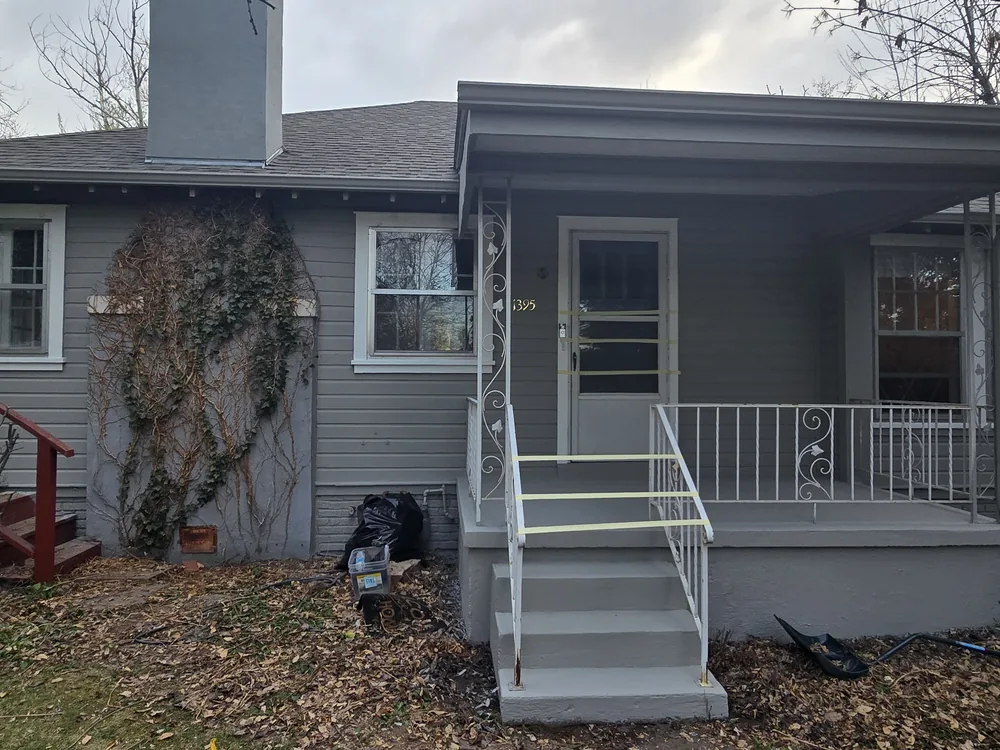 Finished gray exterior and rebuilt porch