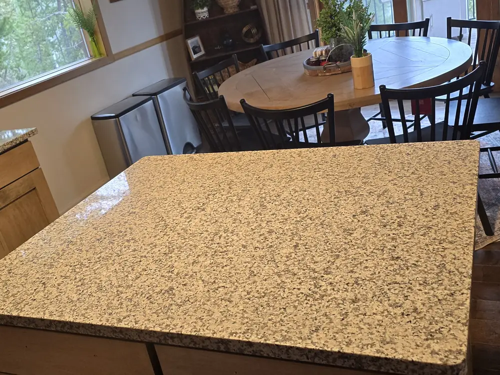 Completed kitchen island with granite countertop