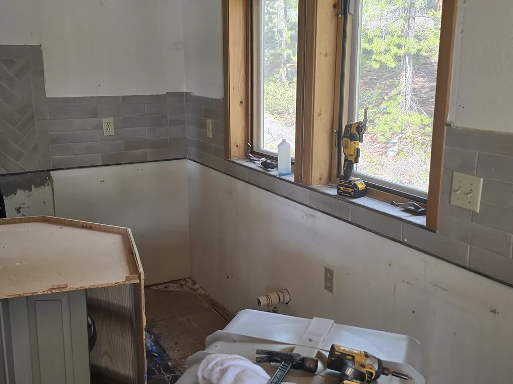 Kitchen cabinet installation during renovation