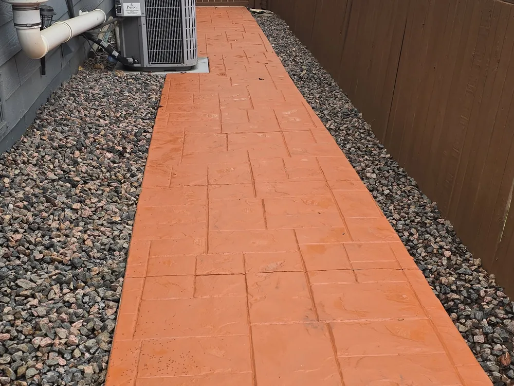 Stamped-concrete walkway after restoration